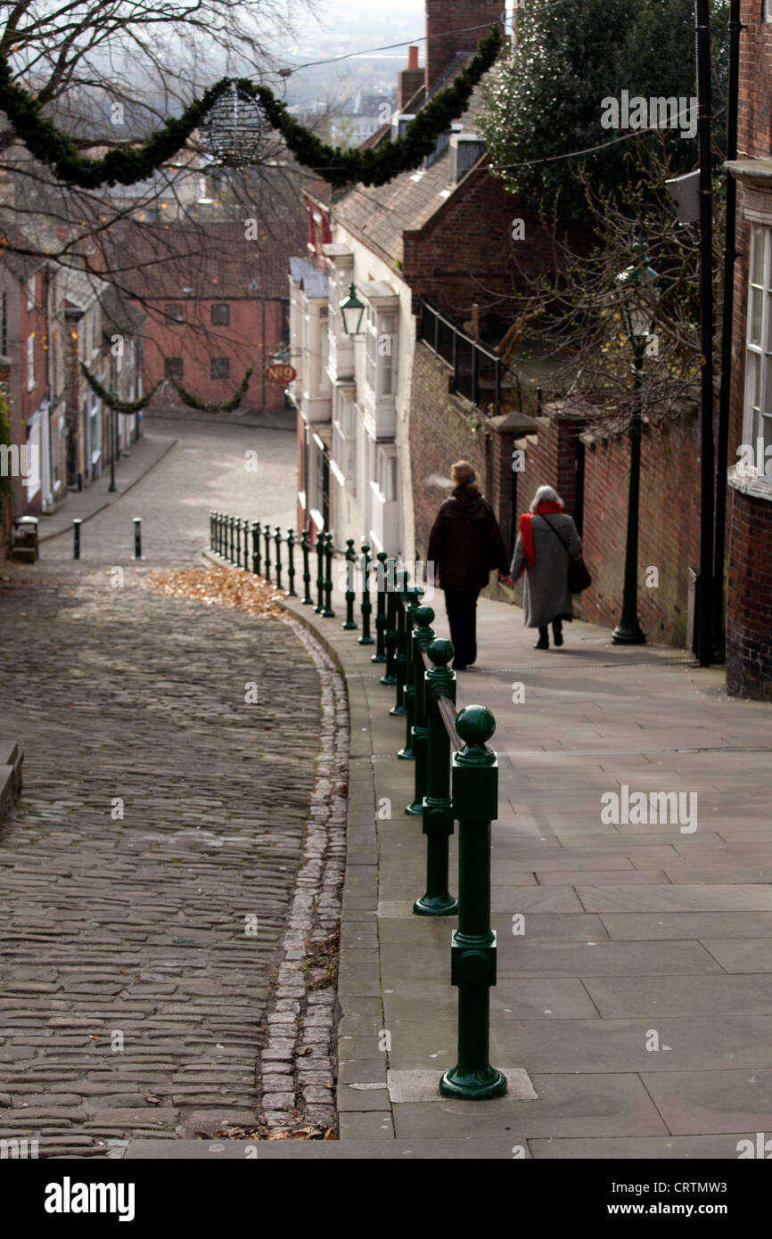 Steep Hill, a popular tourist street in the historic city of Lincoln, Lincolnshire, England. Stock Photo