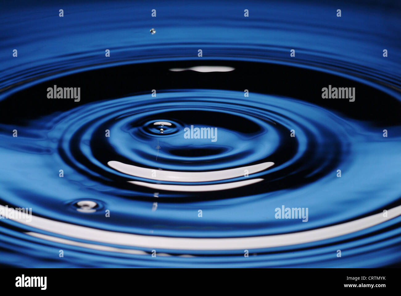 Water drops beats on water surface Stock Photo Alamy