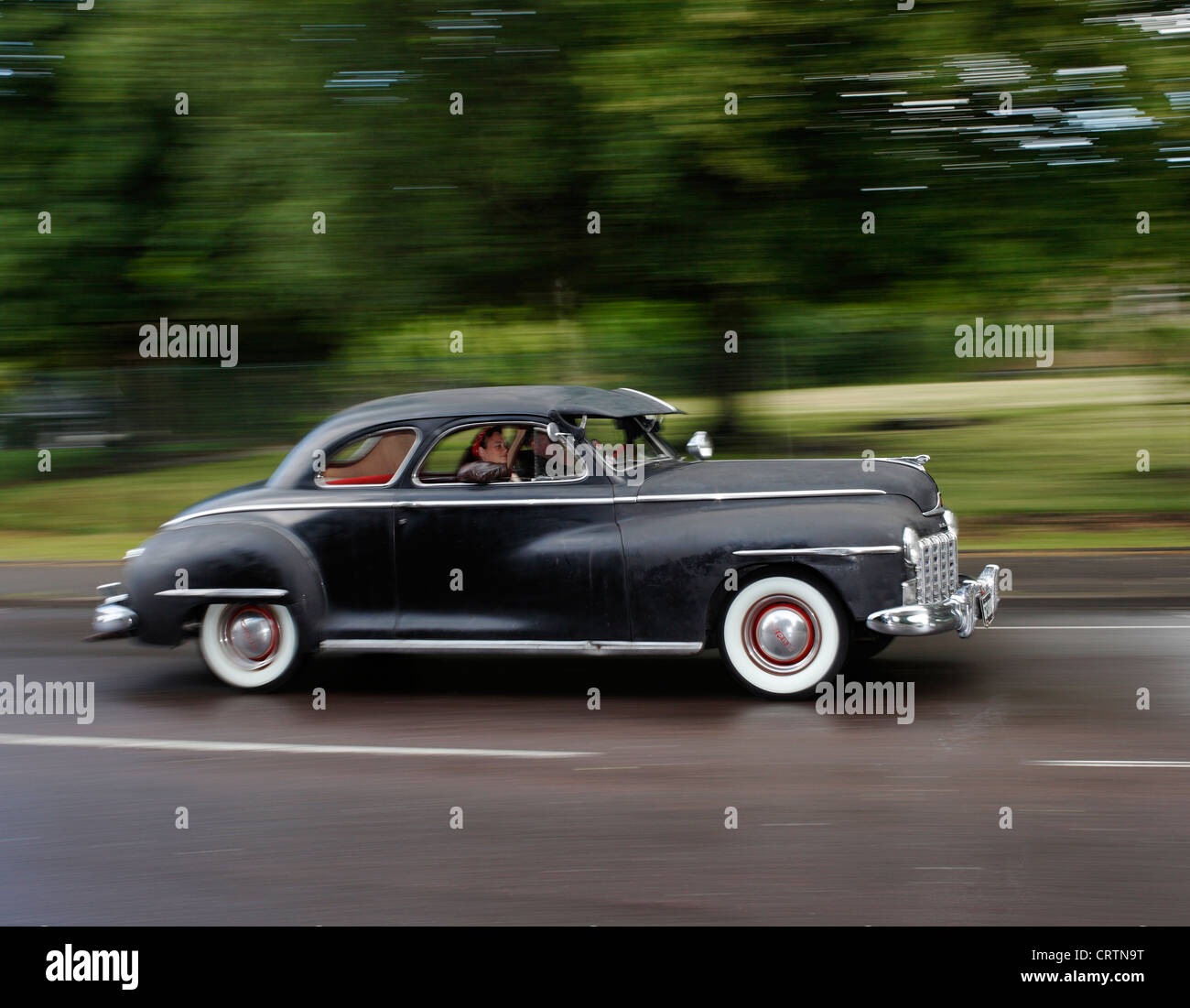 Hot rod Dodge 1947 traveling at speed. Stock Photo