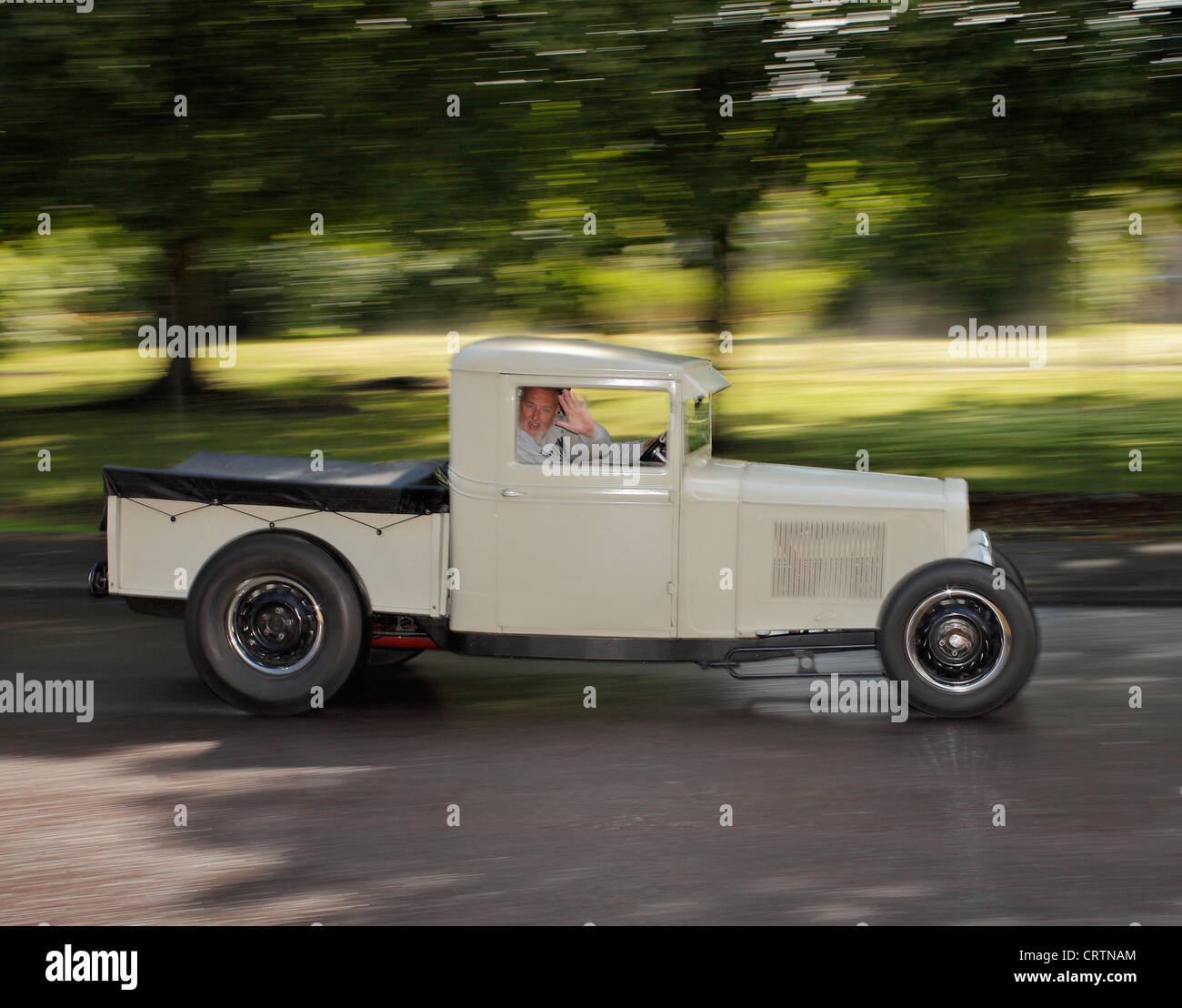 Hot rod traveling at speed. Stock Photo