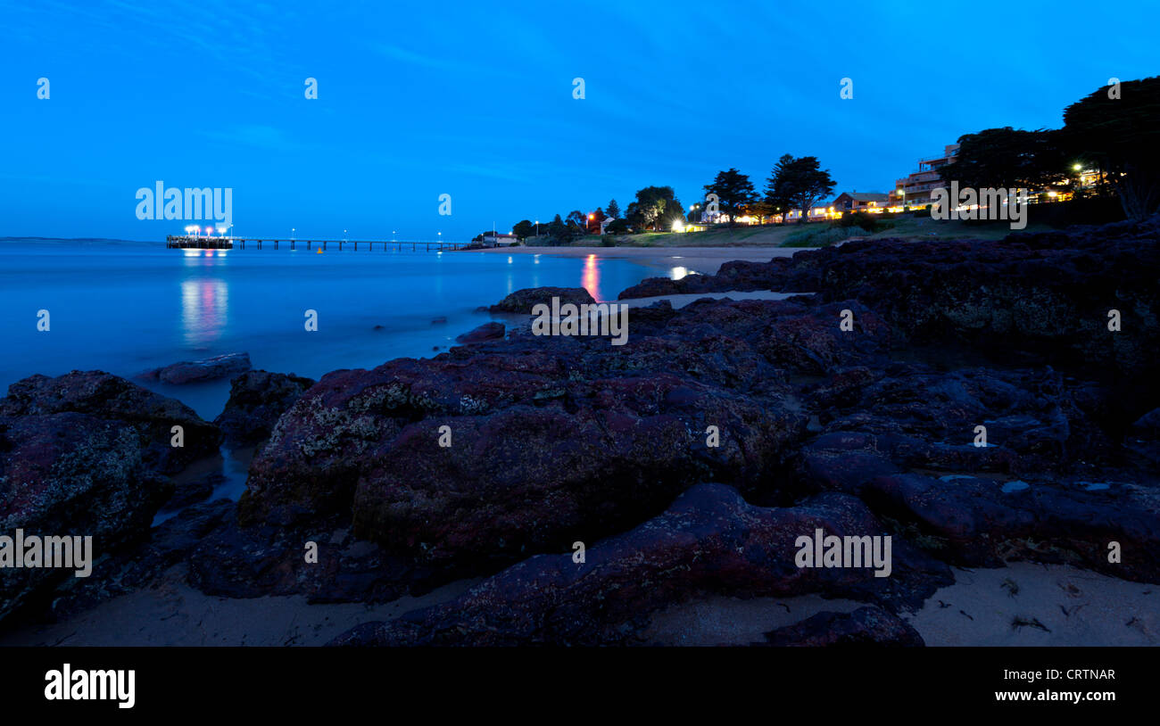 Cowes Jetty in the late evening is a popular tourist destination located on Phillip Island Victoria Australia. Stock Photo