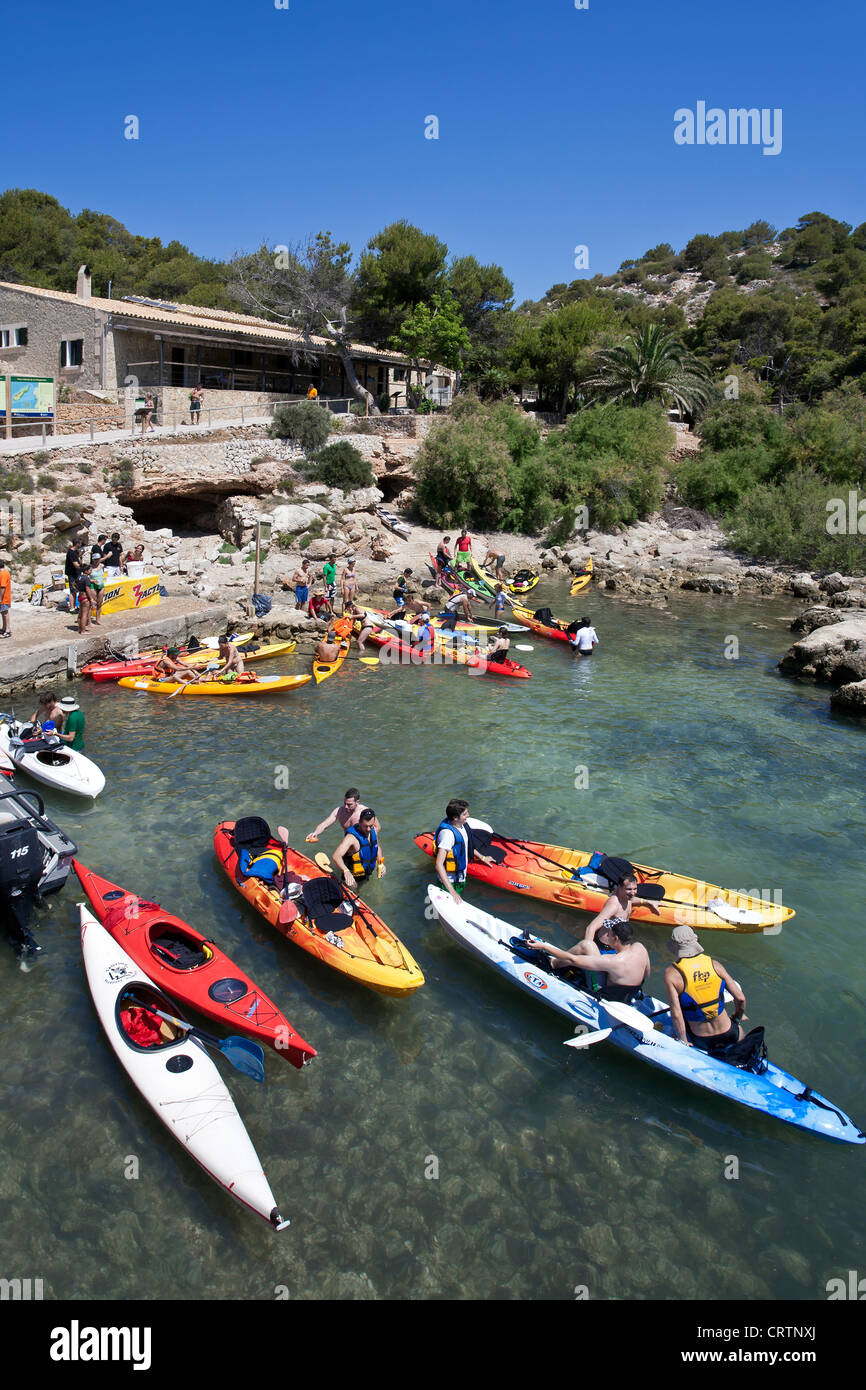 Sea kayakers at Cala Lladó. Dragonera Island Natural Park. Mallorca. Spain Stock Photo