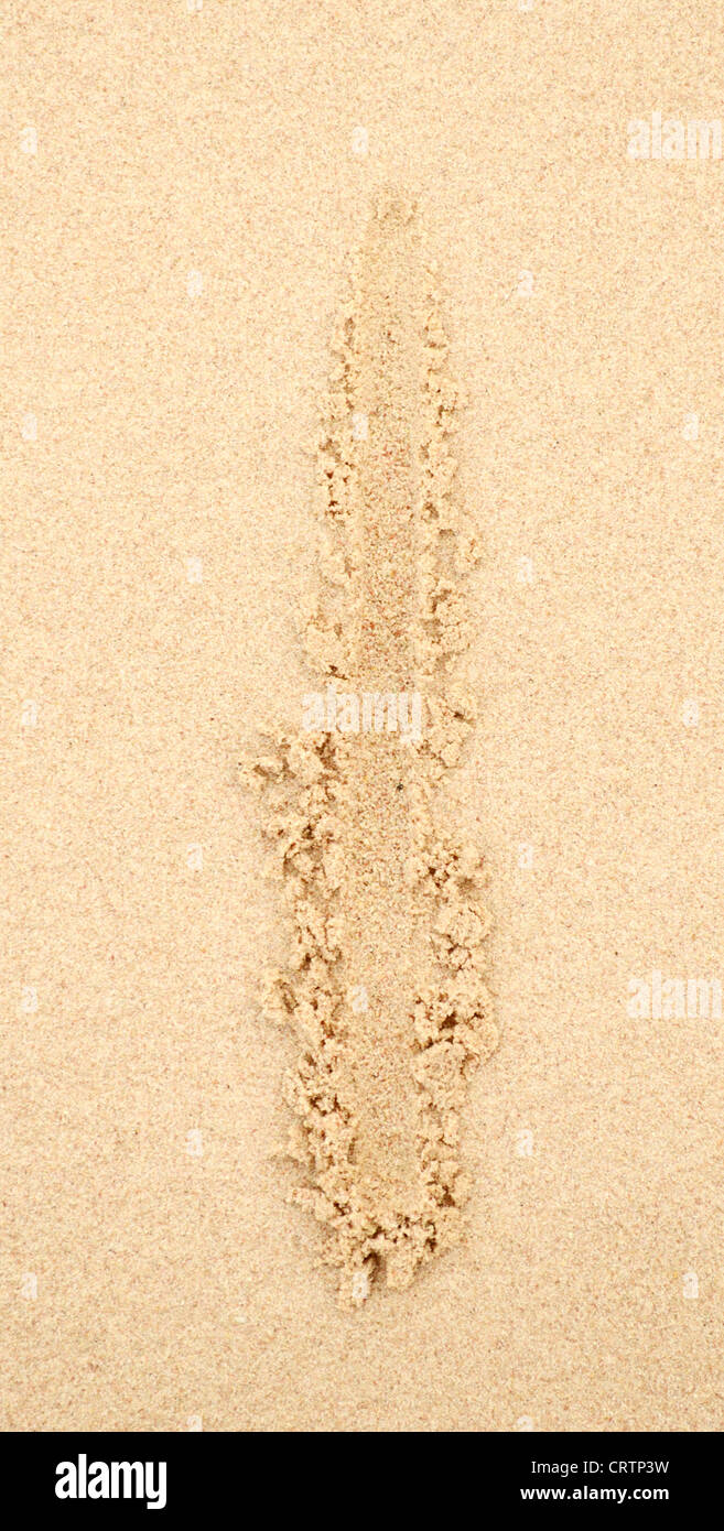 i letter written in the sand Stock Photo
