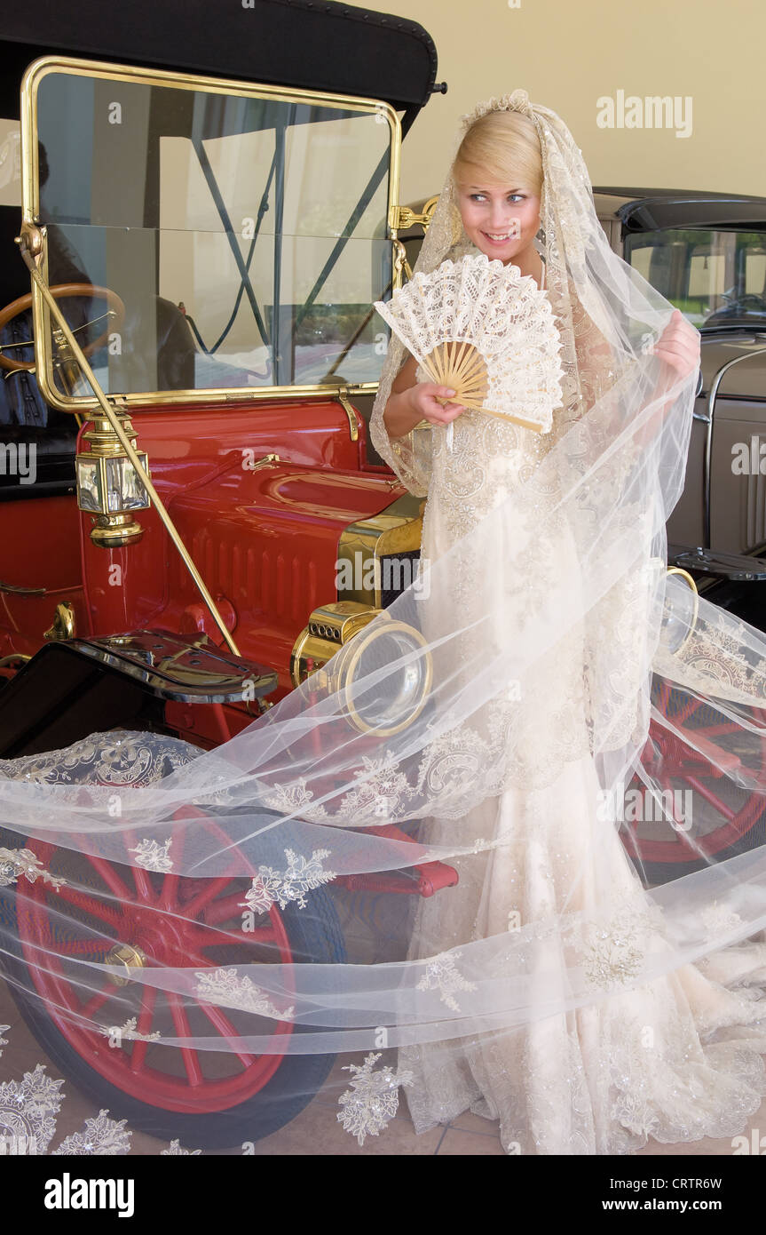 Bride And Antique Car Stock Photo - Alamy