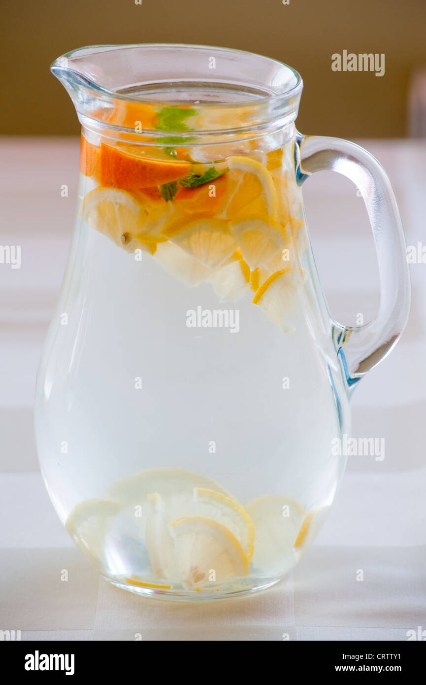 Pitcher with water and fruits Stock Photo Alamy