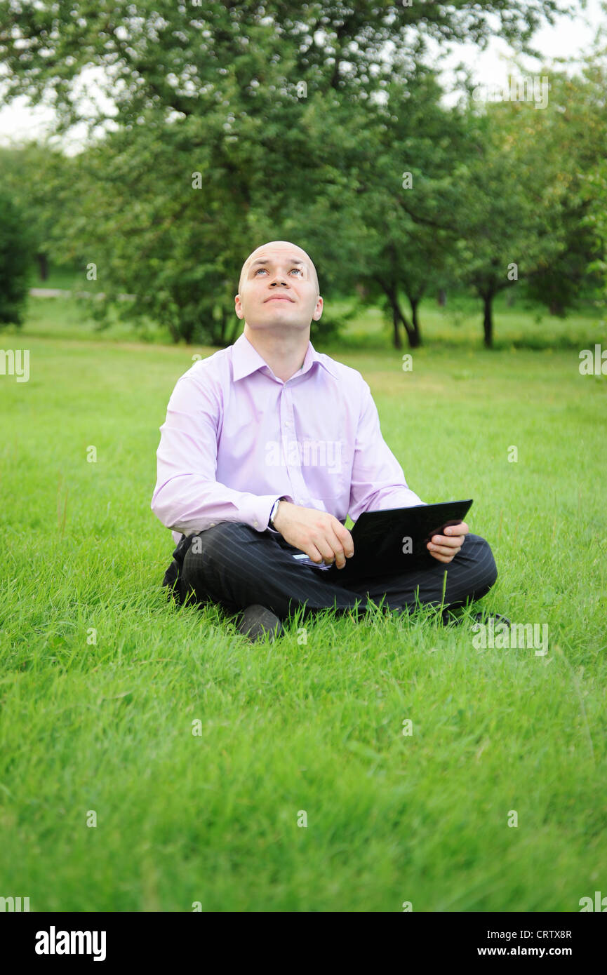 Businessman with laptop Stock Photo - Alamy
