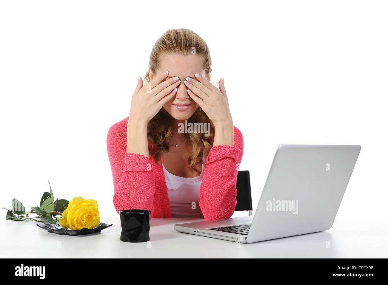 Weeping woman at a computer Stock Photo
