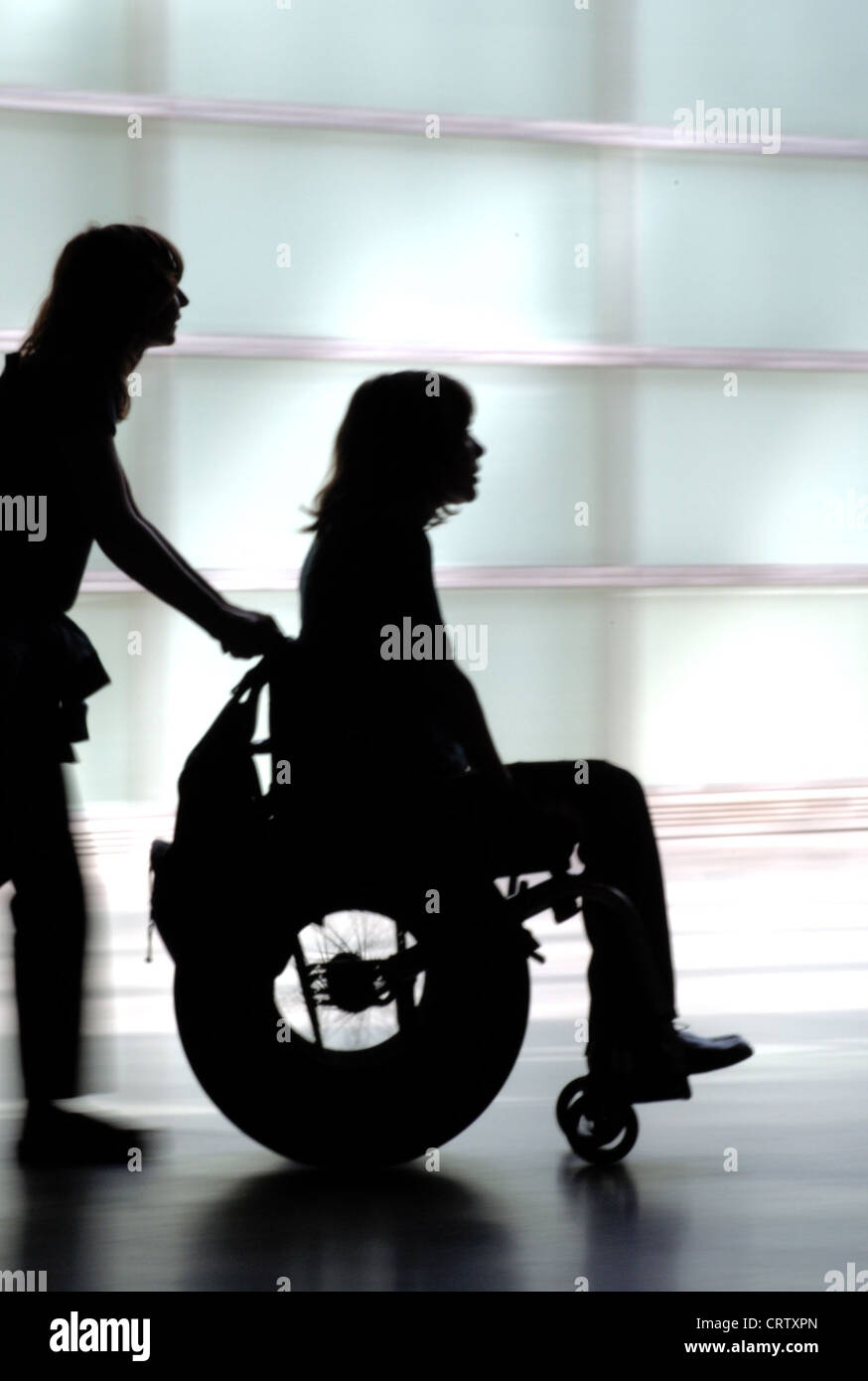Woman In Wheelchair Silhouette High Resolution Stock Photography and ...