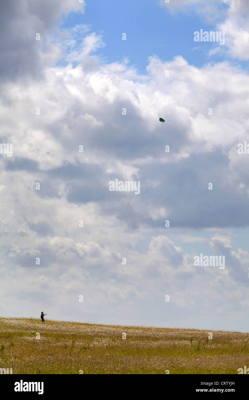 Flying a kite above the Gog Magogs, Cambridge, England, UK Stock Photo