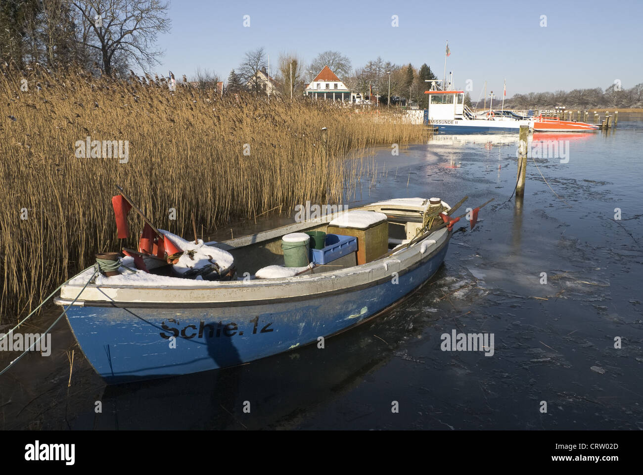 Fishing boat in the frozen Schlei near Missunde Stock Photo