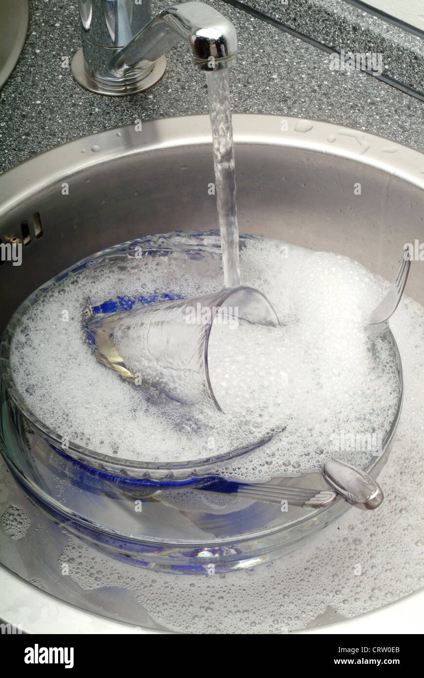 Dishes in Sink Stock Photo - Alamy