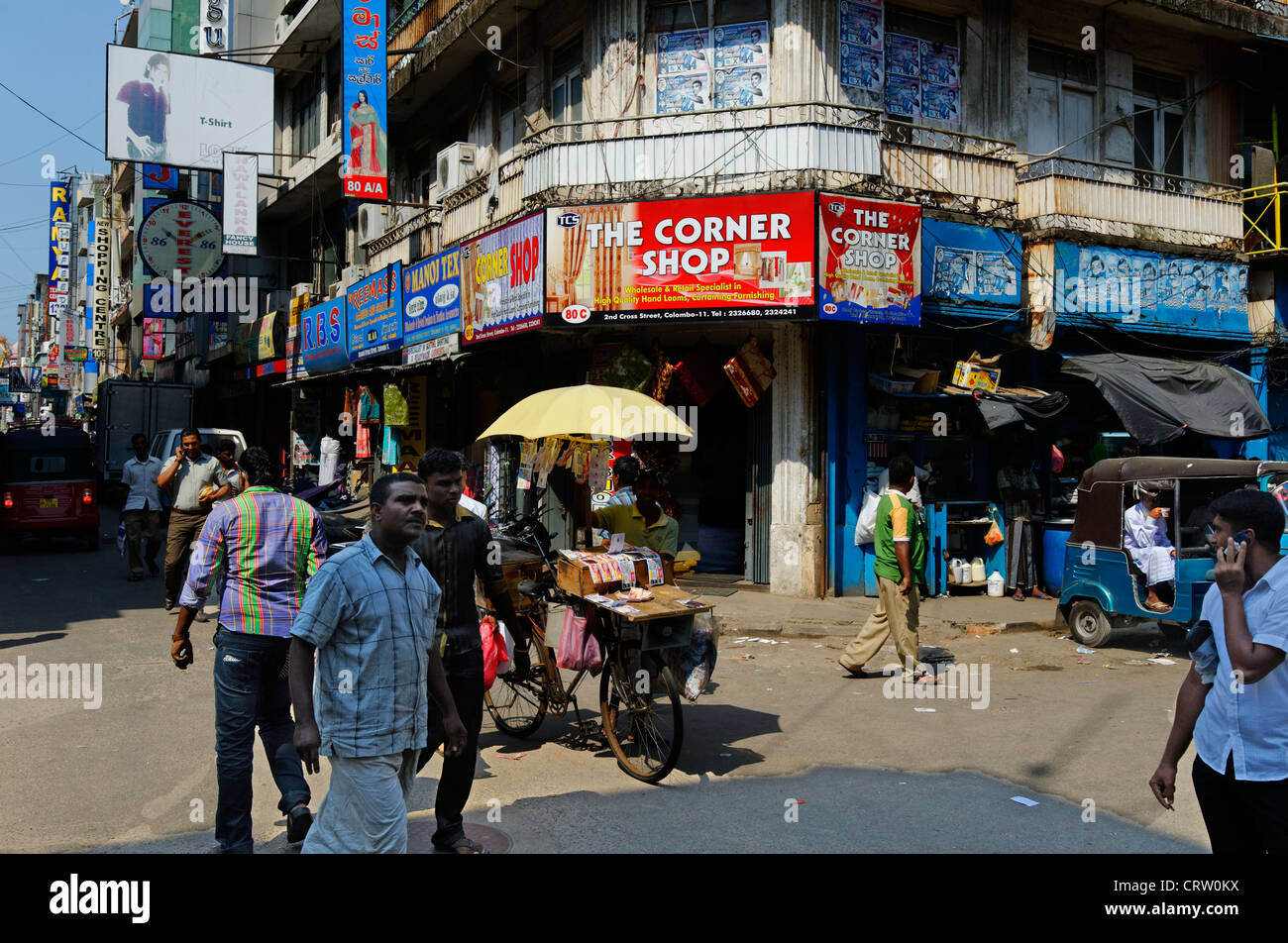 Busy street and corner shop in Pettah Market area of Colombo Sri Lanka,Asia Stock Photo