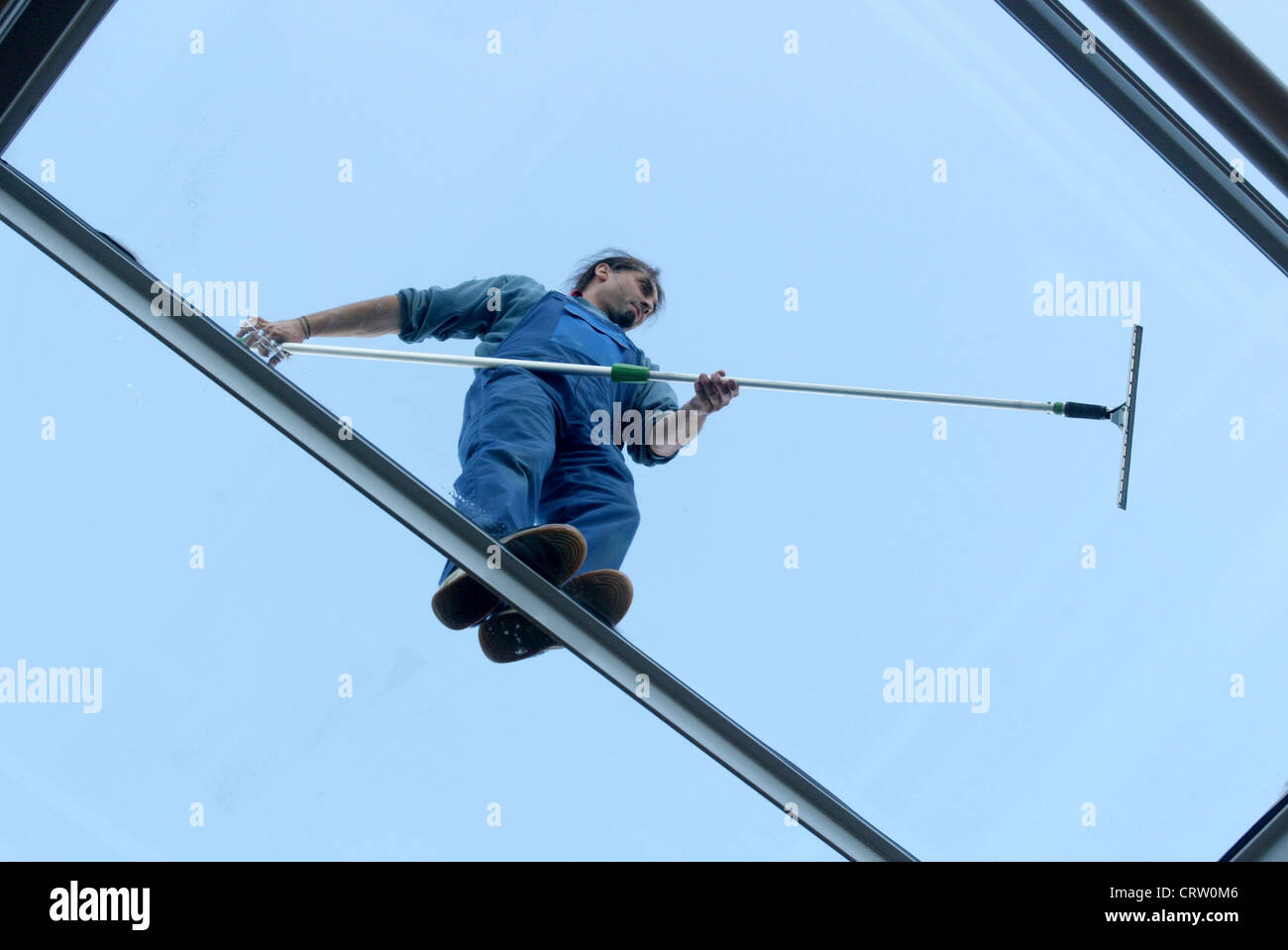 Patrick Ruff Window Washer A window washer cleans the glass roof, Duisburg Stock Photo - Alamy