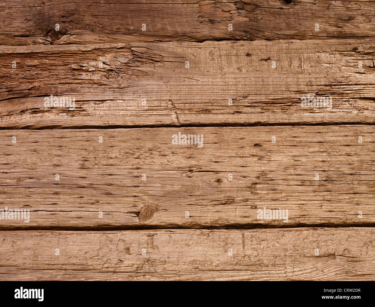 wooden railway sleepers making a textured wood background Stock Photo