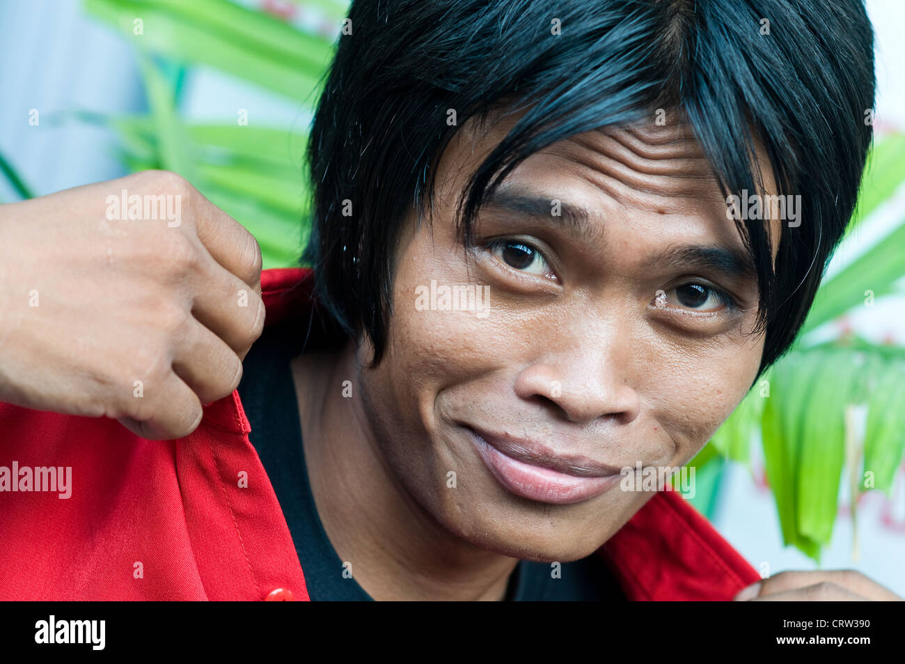 indonesian man in Kuta, Bali, Indonesia Stock Photo