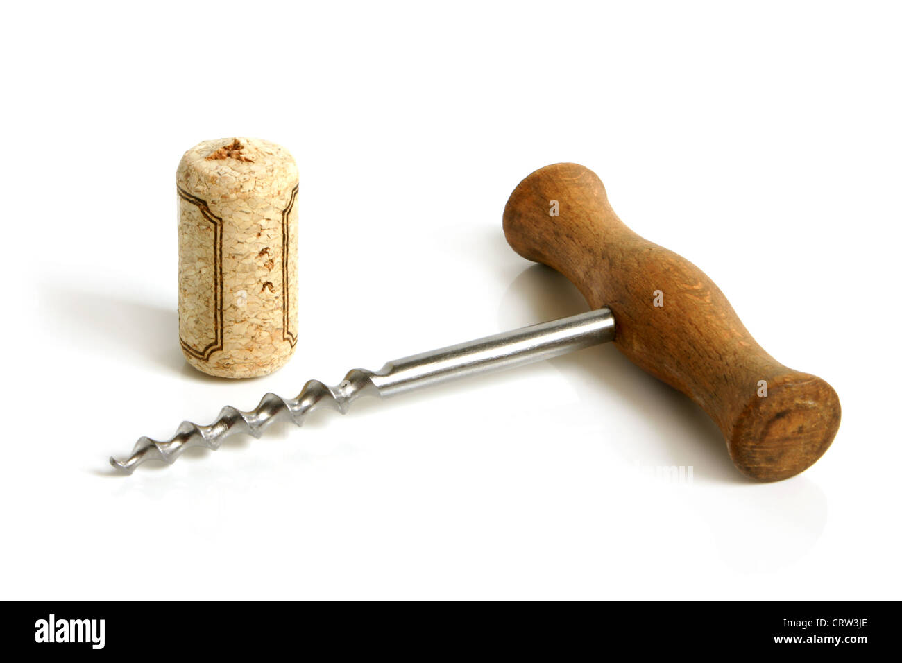 Old corkscrew and cork Stock Photo