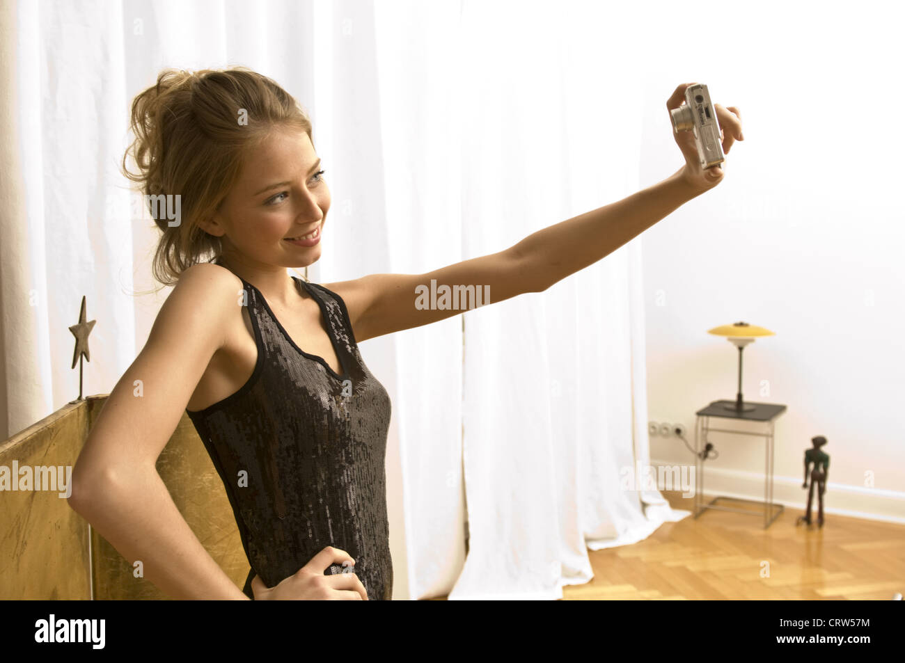 woman photographing herself Stock Photo