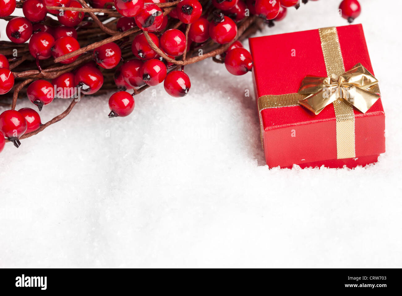 gift boxes with european holly Stock Photo Alamy