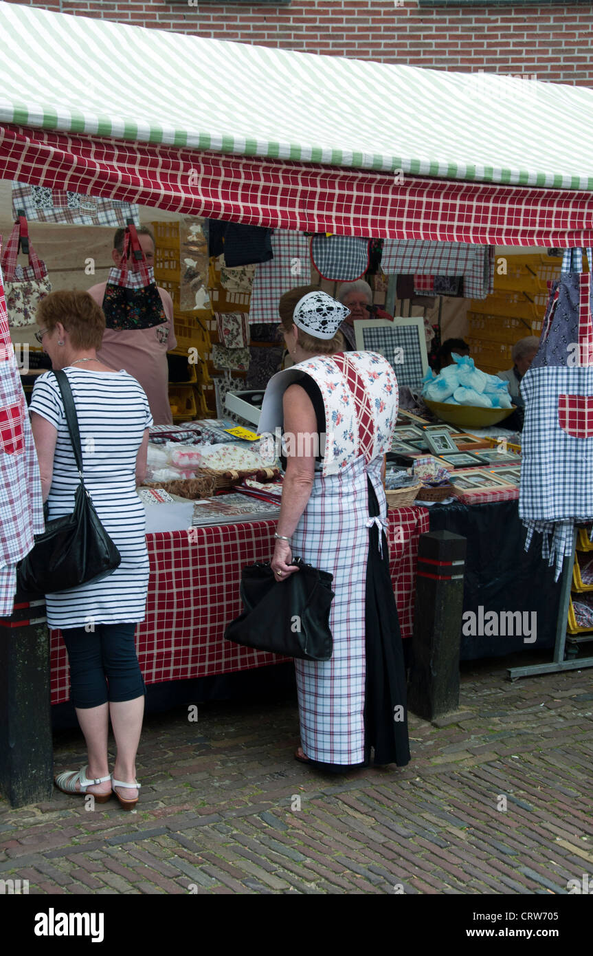 SPAKENBURG,HOLLAND - AUGUST 03:Unidentified woman in original clothes on the market, on the traditional days of spakenburg Stock Photo