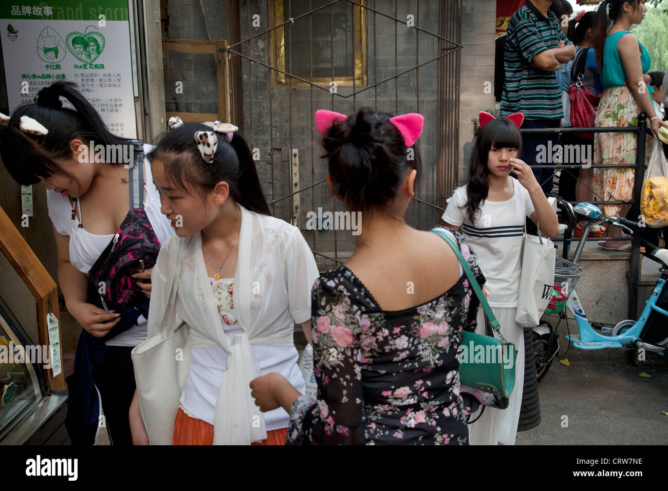 Group of girls wearing cat ears in Shichahai, Beijing, China. This is a