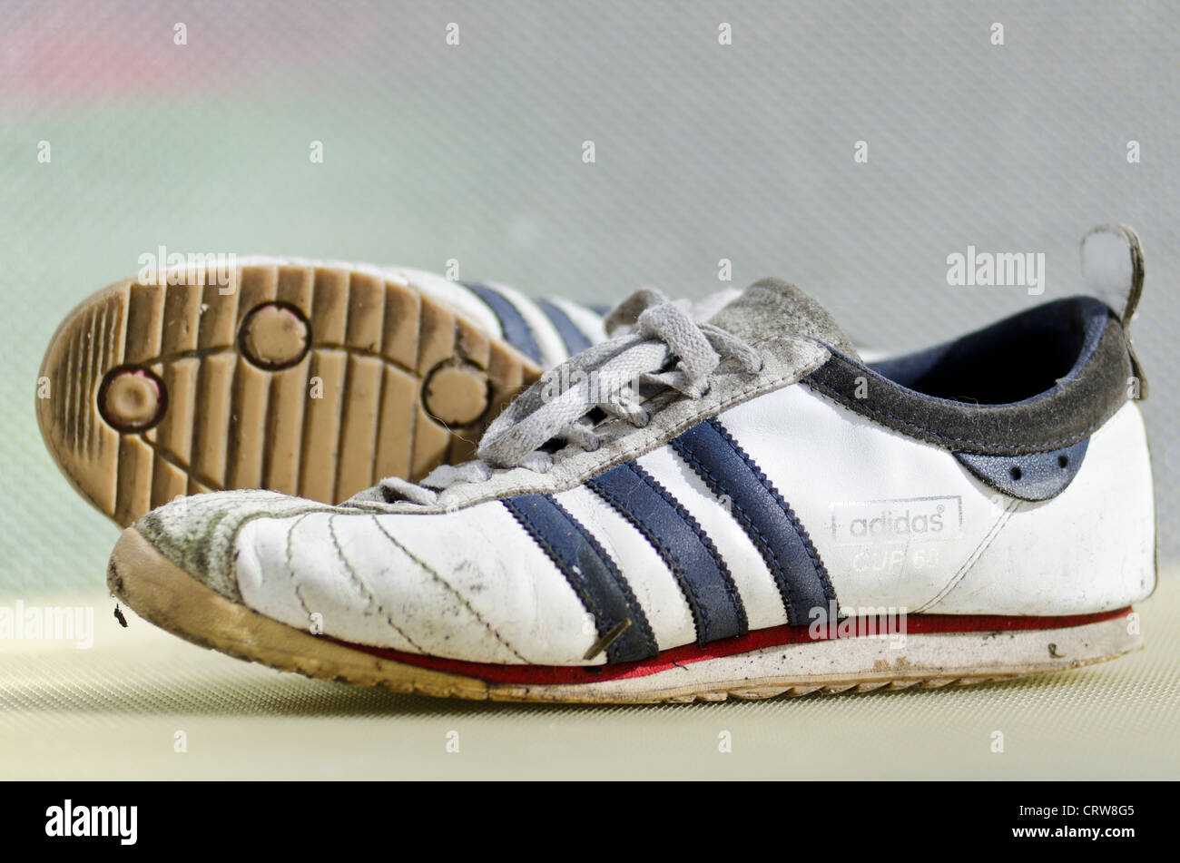 Pair of Worn Adidas Cup 68 Trainers Stock Photo - Alamy