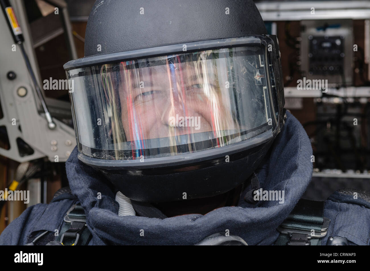 Man wearing bomb-proof suit and helmet as used by bomb squad ATOs. Stock Photo