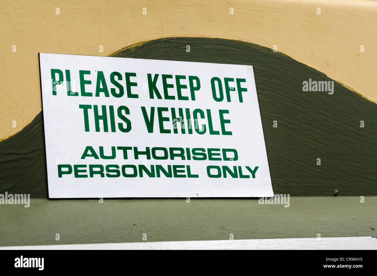 Sign on a military vehicle 'Please keep off this vehicle, Authorised personnel only' Stock Photo
