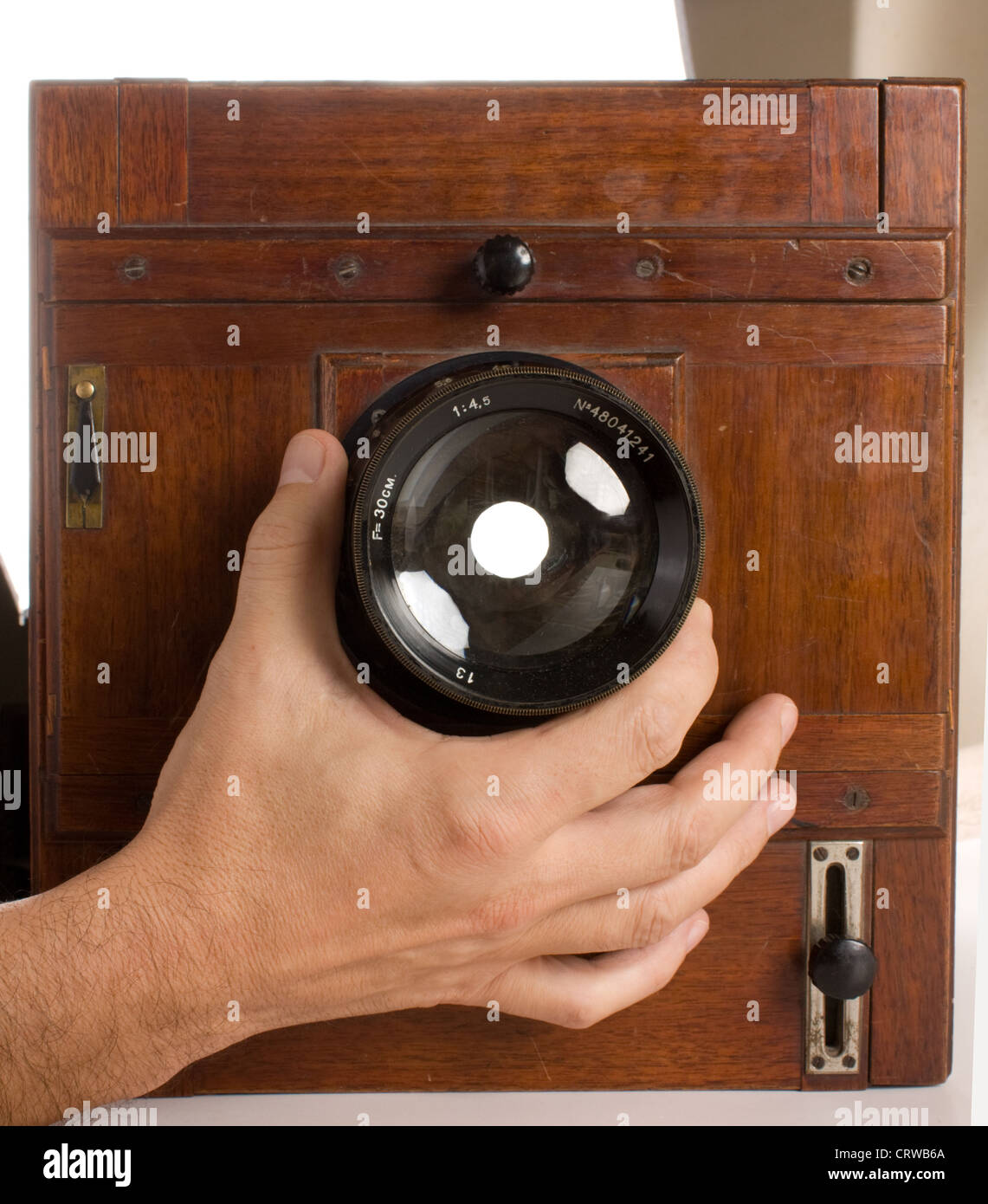 hand turns the lens Stock Photo Alamy