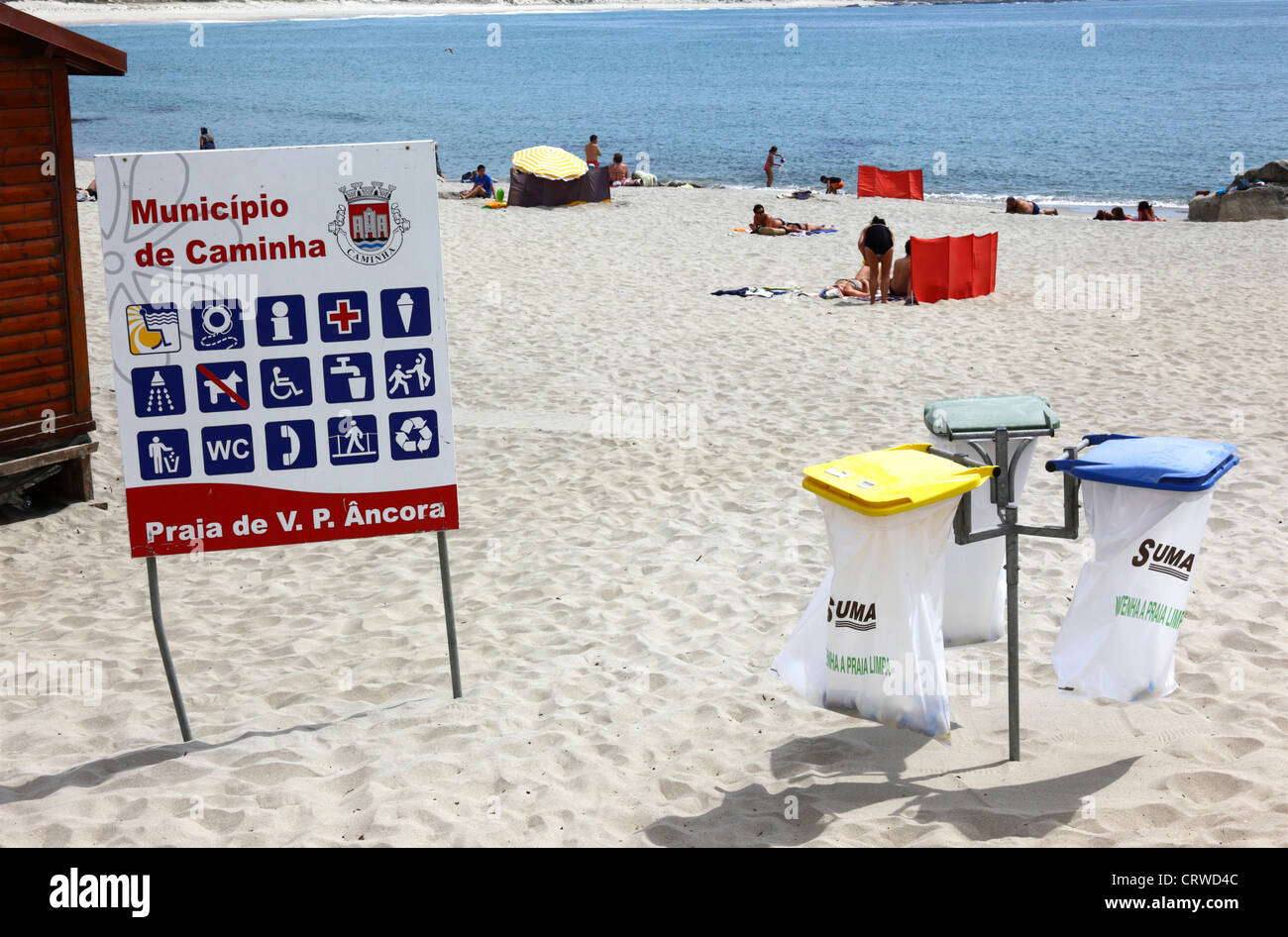 Rubbish bins and facilities information sign on beach at Vila Praia de Ancora , near Caminha , Minho Province, northern Portugal Stock Photo
