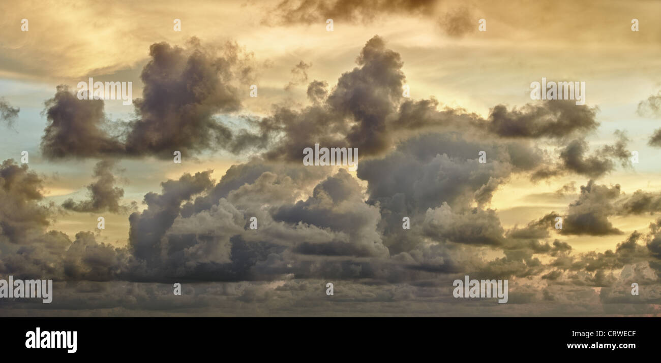 Dark storm clouds in evening sky - panorama Stock Photo