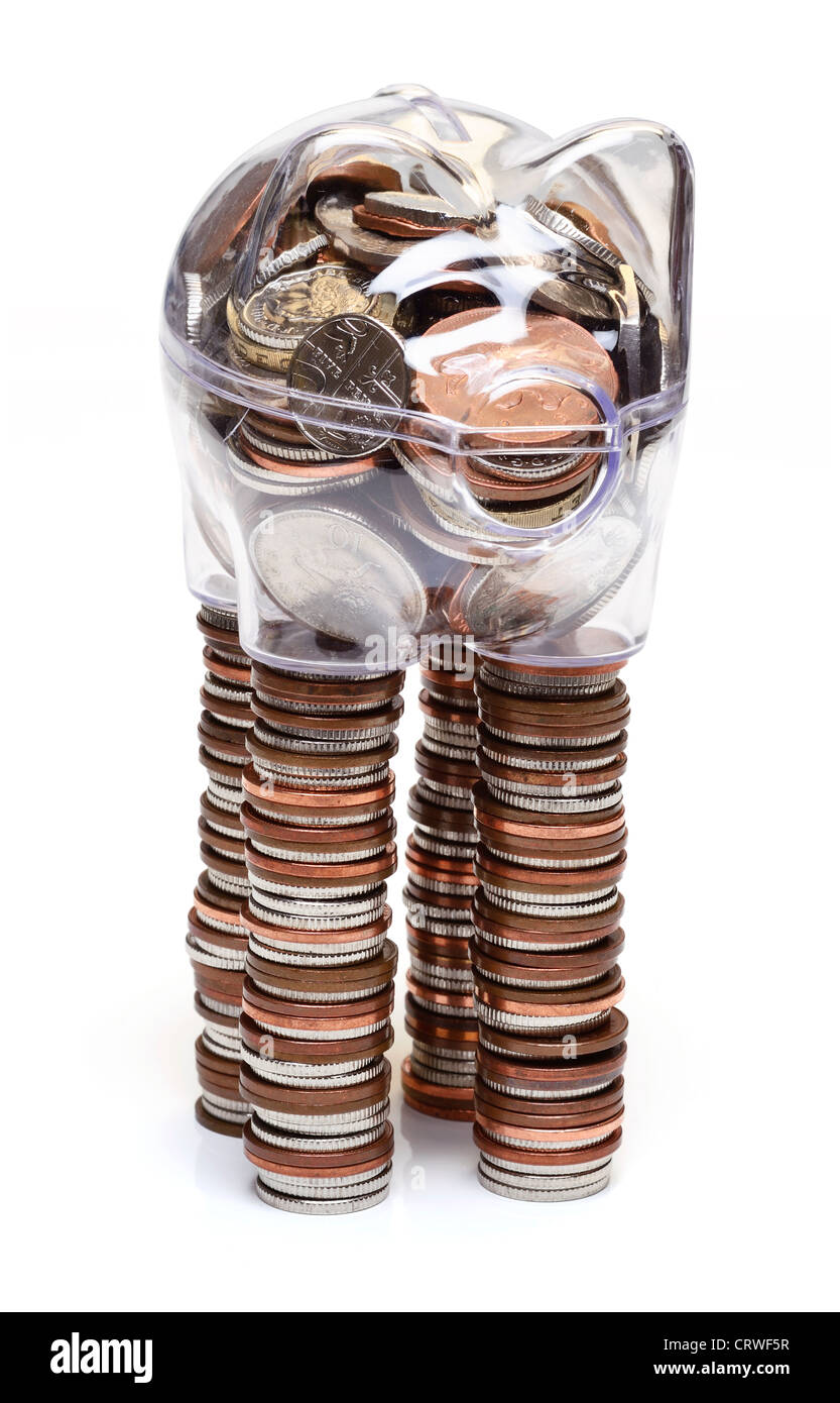 Piggy bank on stilts made of coins Stock Photo