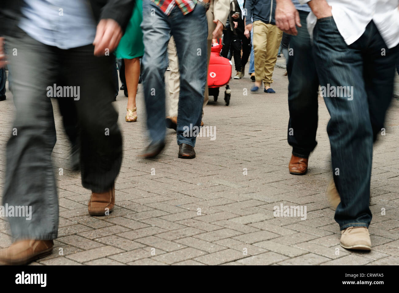 Crowds of people with motion blur Stock Photo
