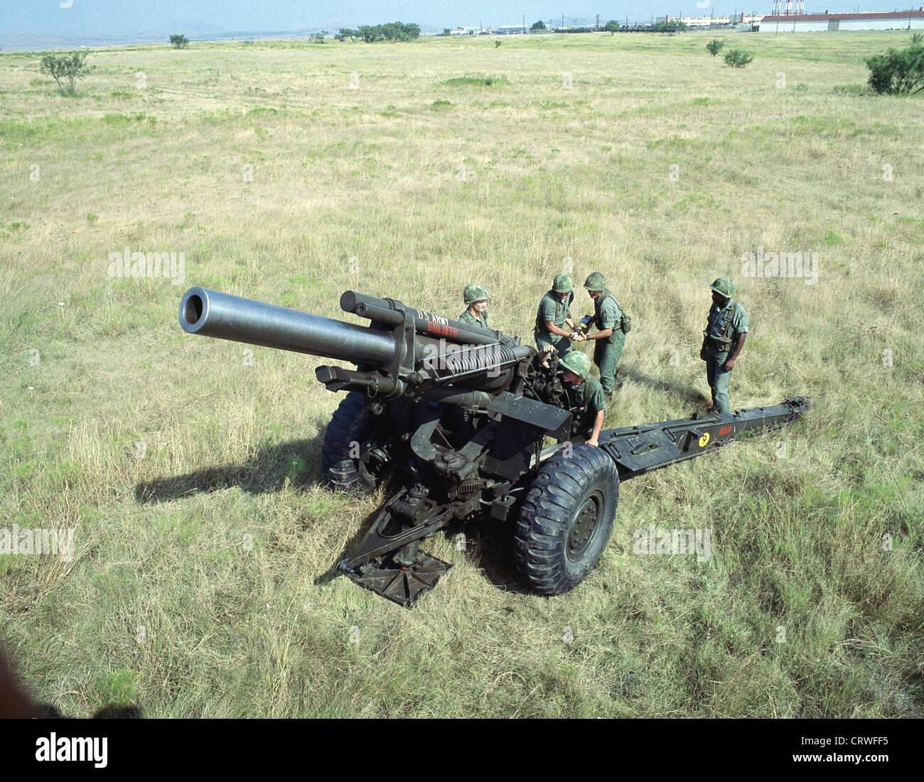 An M114 155 mm Howitzer in firing position. Stock Photo