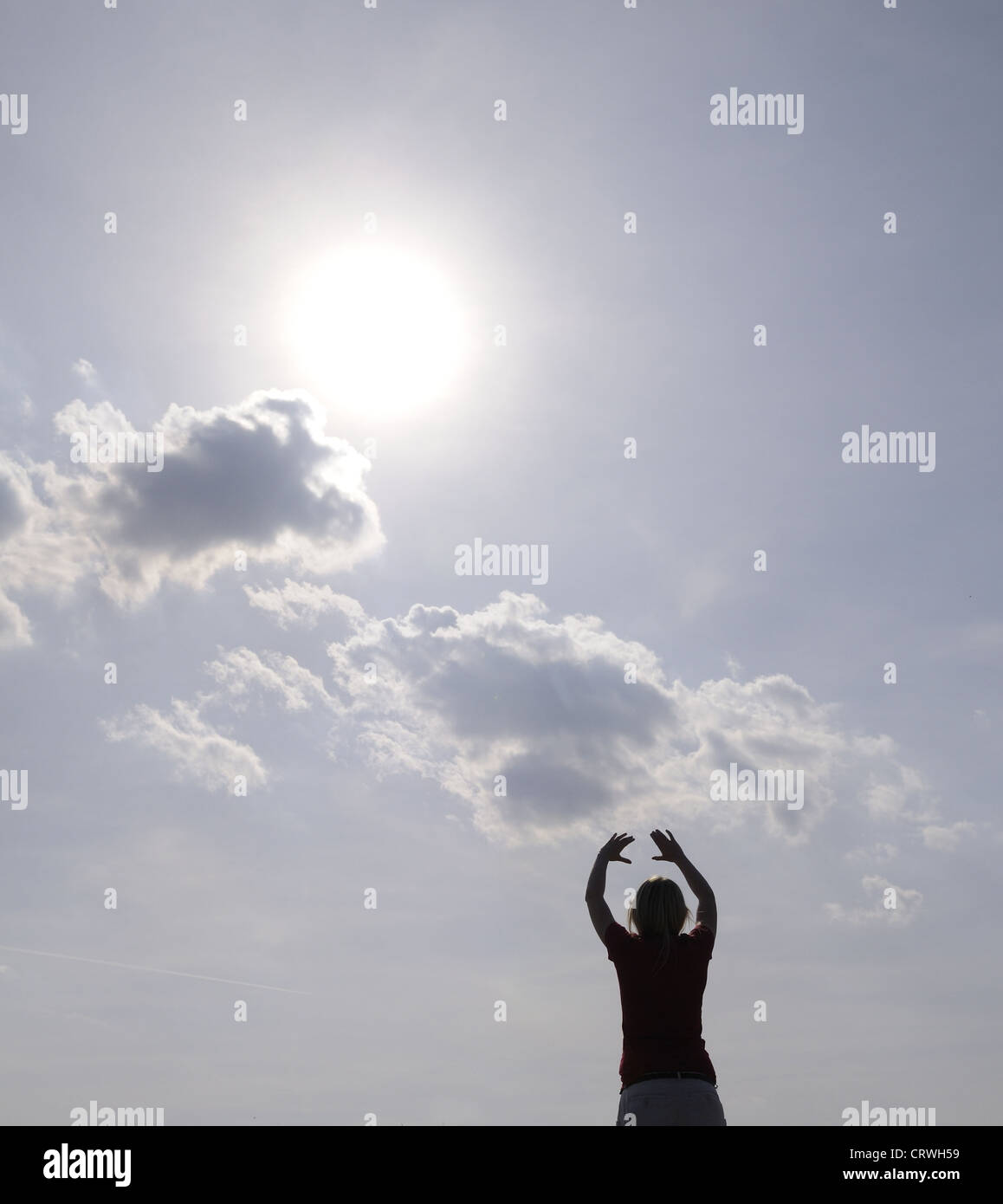Woman silhouette arms up hi-res stock photography and images - Alamy