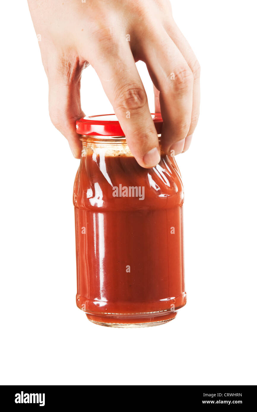 jar tomato paste in hand Stock Photo Alamy