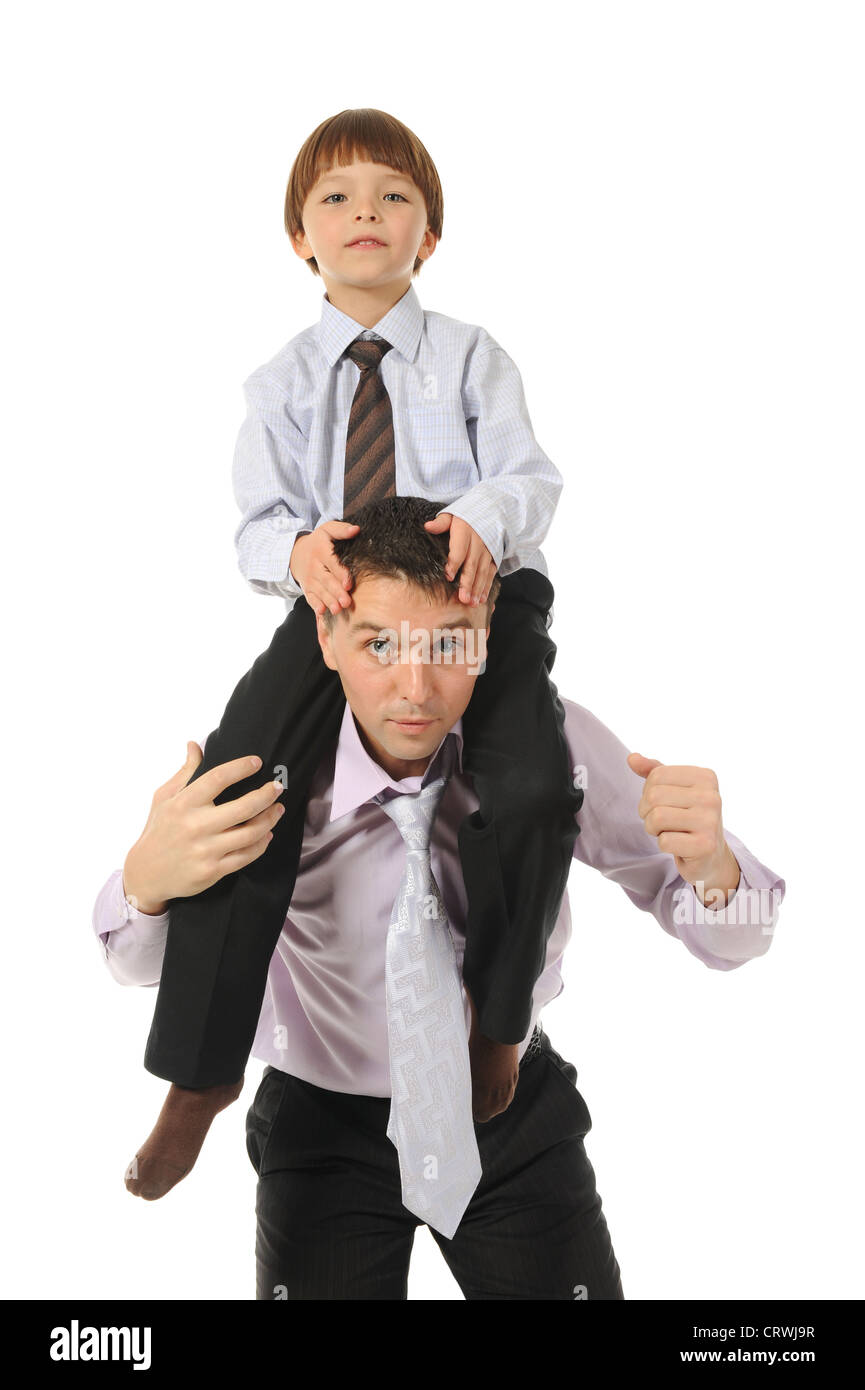 lucky son sitting on his father stretches Stock Photo - Alamy