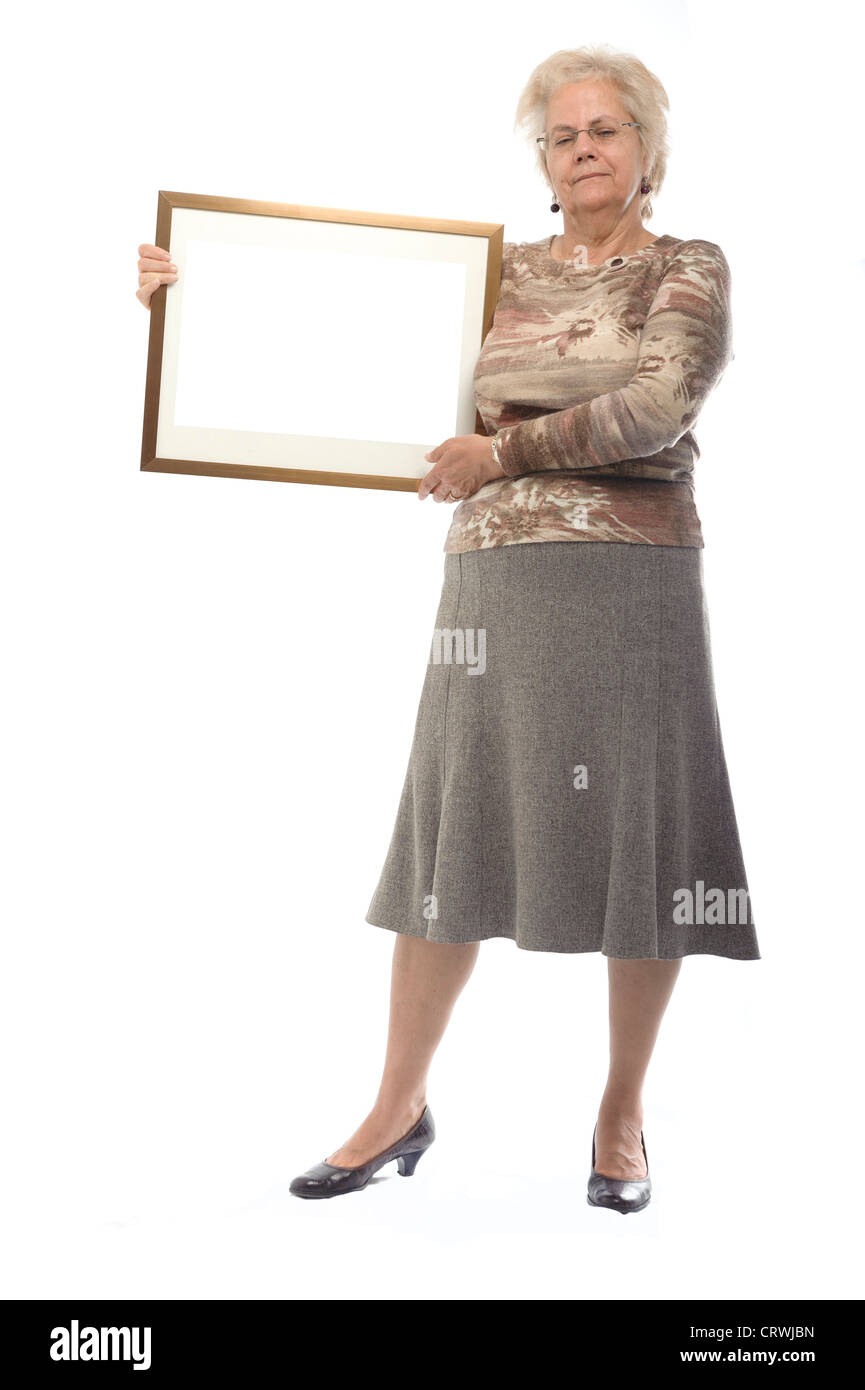 Middle aged woman holding blank picture frame Stock Photo - Alamy