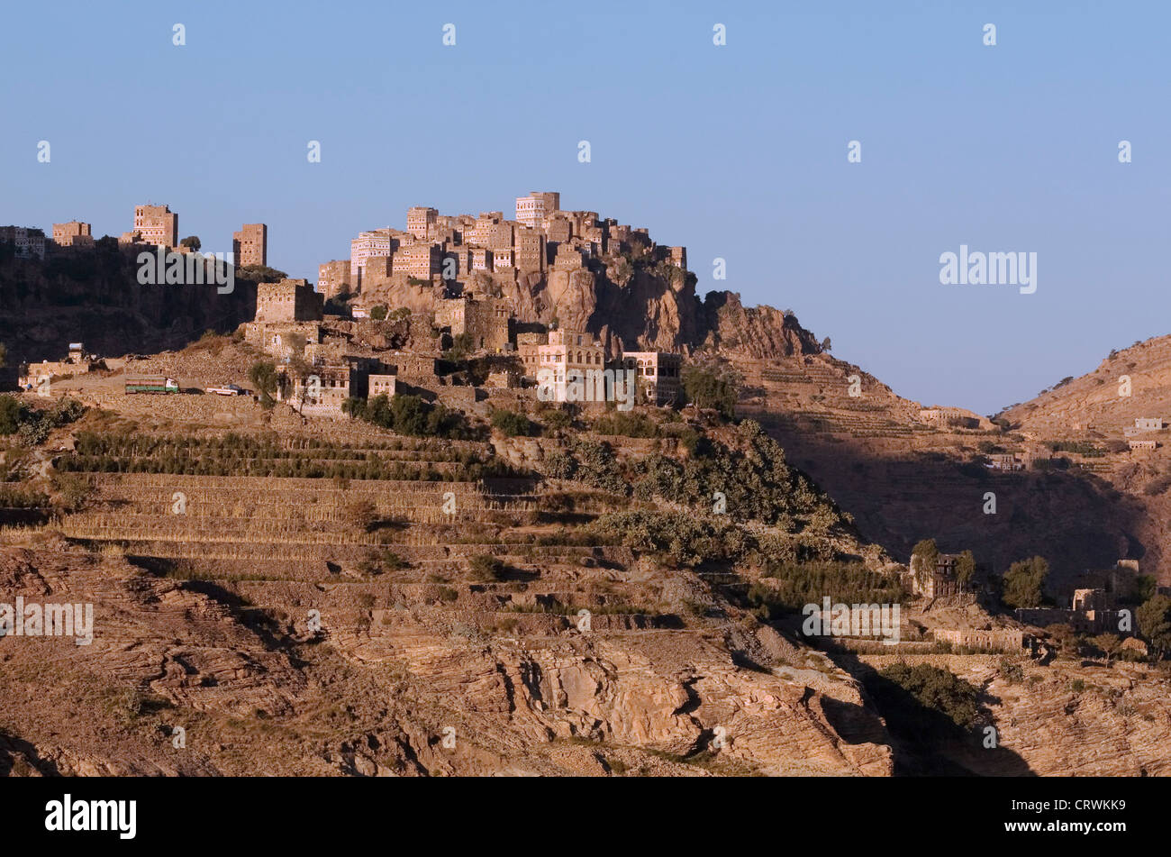 Early morning light on the ridgetop village of al-Hajjara, Haraz Mountains, Al-Mahwit, Yemen Stock Photo