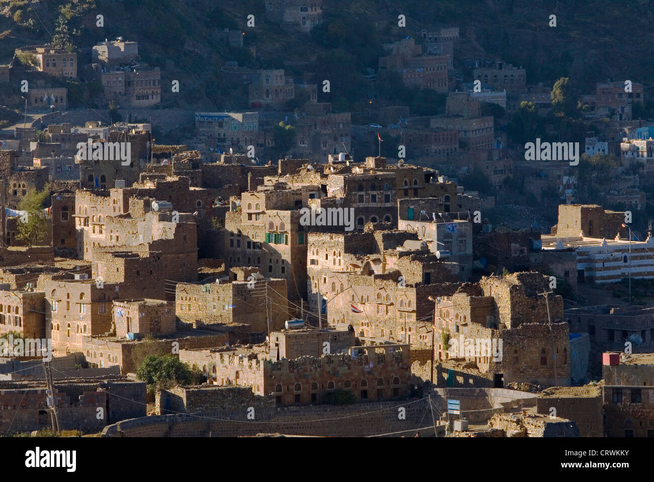 Early morning light on the ridgetop village of al-Hajjara, Haraz Mountains, Al-Mahwit, Yemen Stock Photo