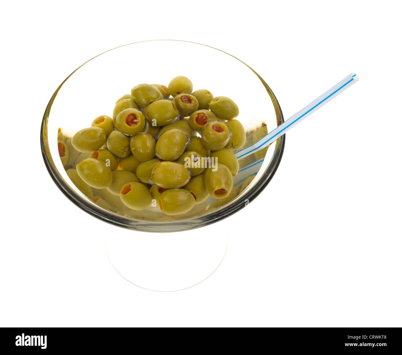 Olives in martini glass with straw Stock Photo Alamy