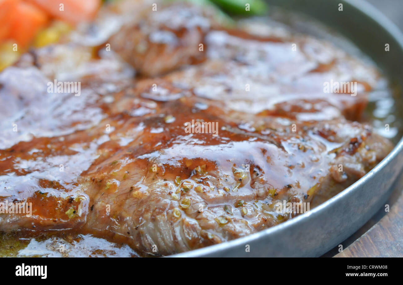 Sirloin beef steak with delicious sauce Stock Photo Alamy
