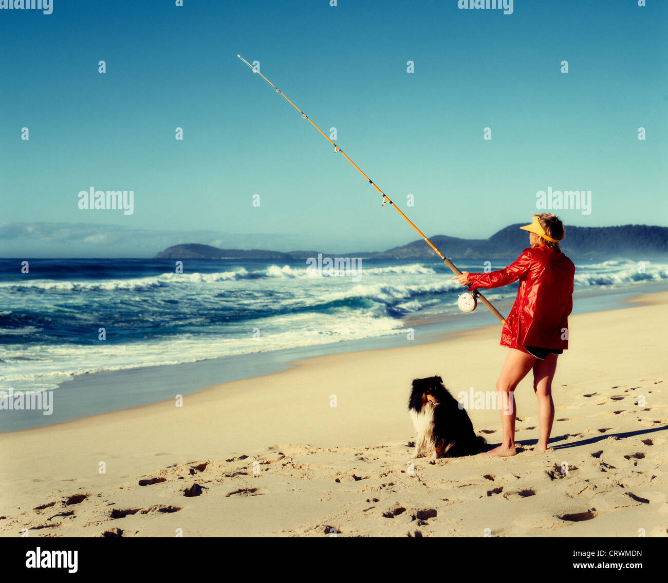 Fishing woman beach australia sea hi-res stock photography and
