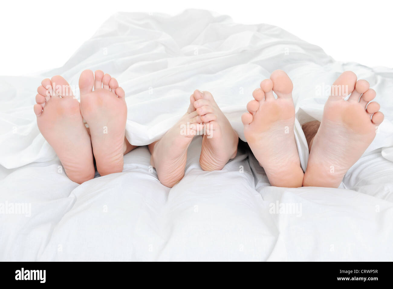 Man lying down feet up bed hires stock photography and images Alamy