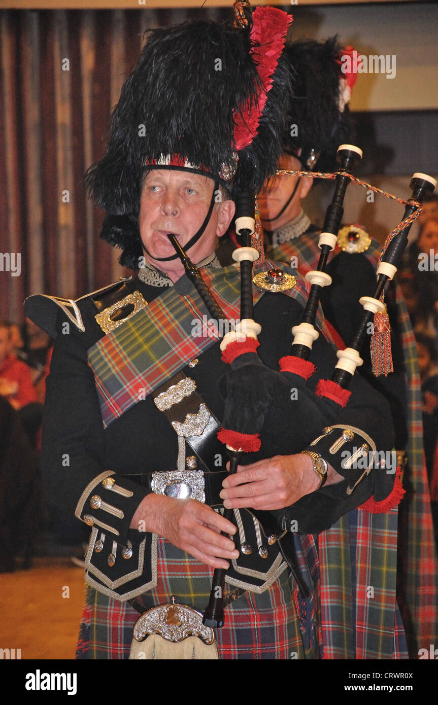 Scottish Highland bagpipe player, Surrey, England, United Kingdom Stock Photo