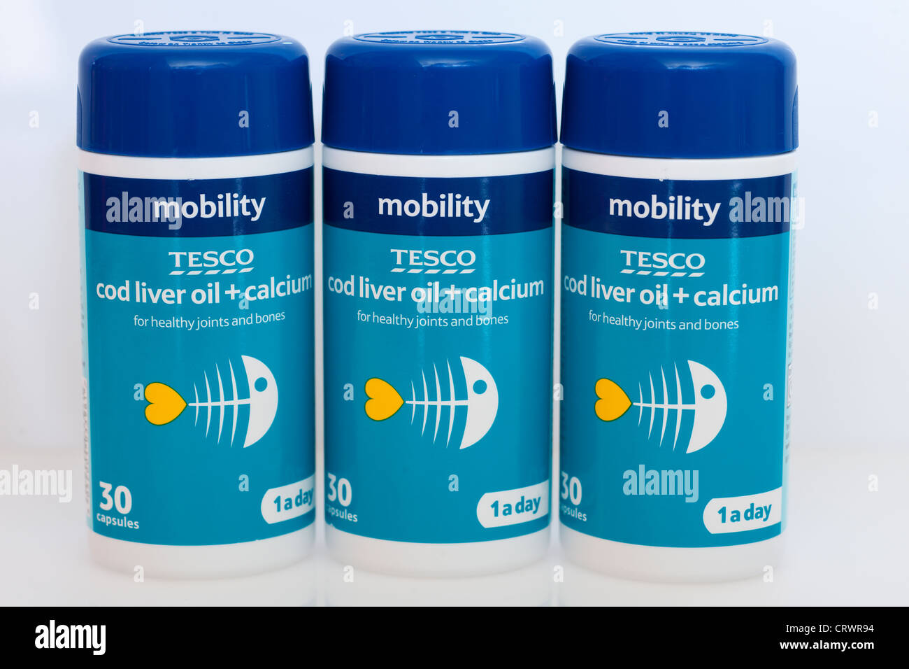 Containers of Tesco mobility cod liver oil and calcium capsules Stock