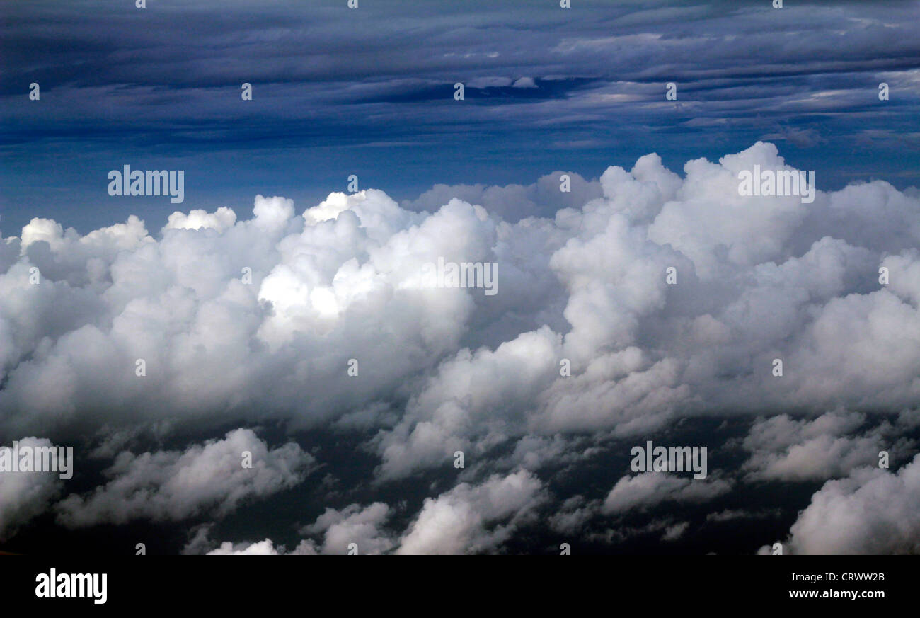 Clouds from a plane window Stock Photo