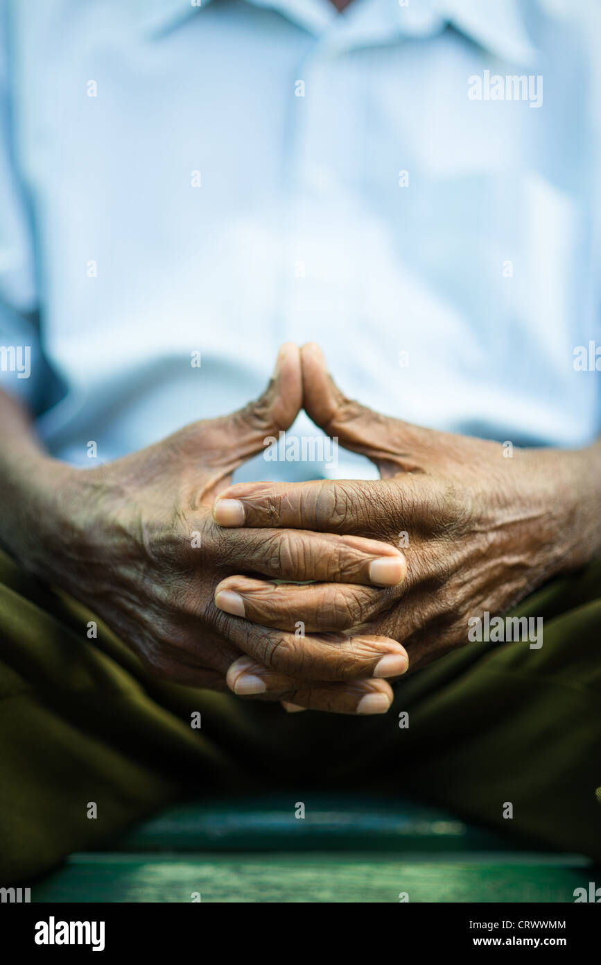 closeup of hands of elderly african american man sitting on bench Stock ...