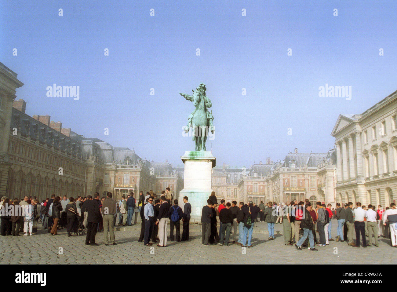 Tourists in front of the Palace of Versailles Stock Photo