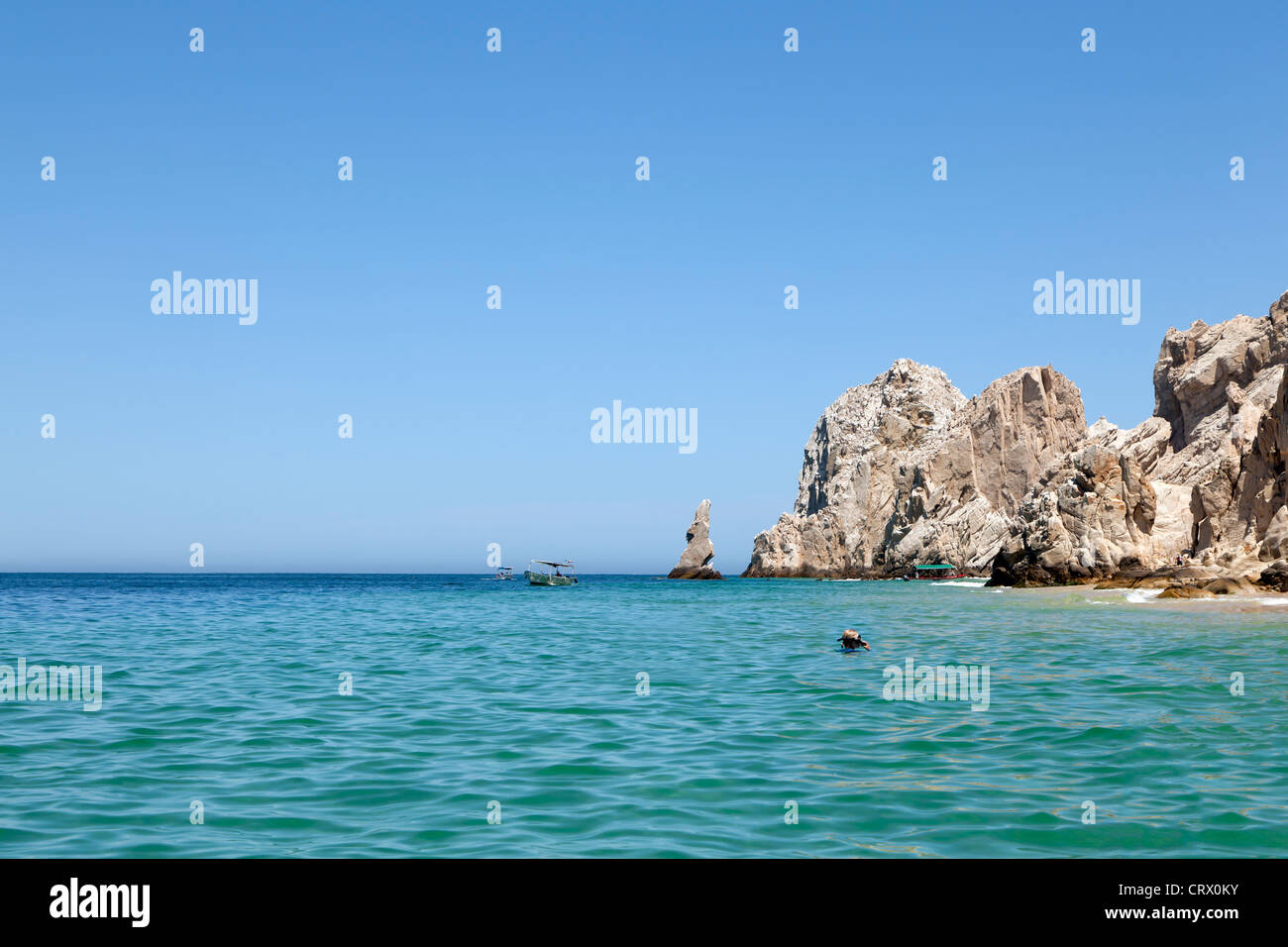 Woman snorkeling next to Lover's Beach in Los Cabos, Mexico Stock Photo Alamy
