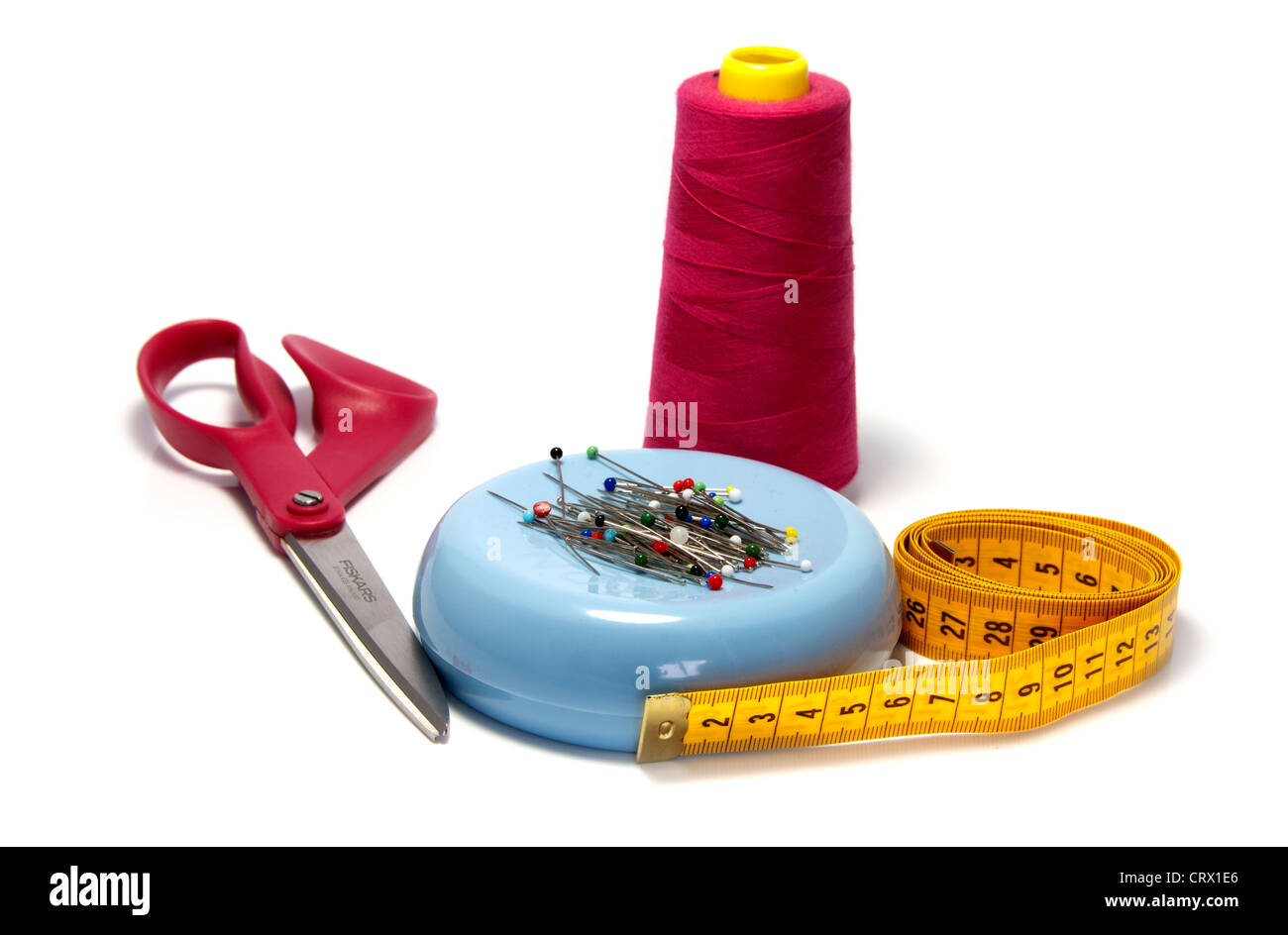 sewing tools with cotton scissors and measurement tool Stock Photo Alamy